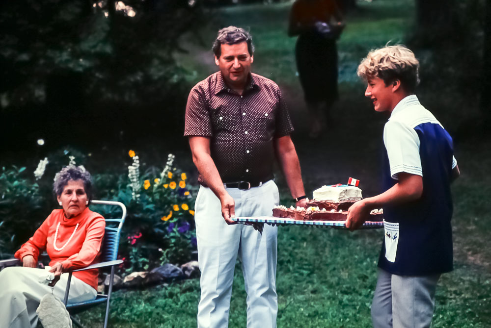 1980 Barry and Drew carry in the cake