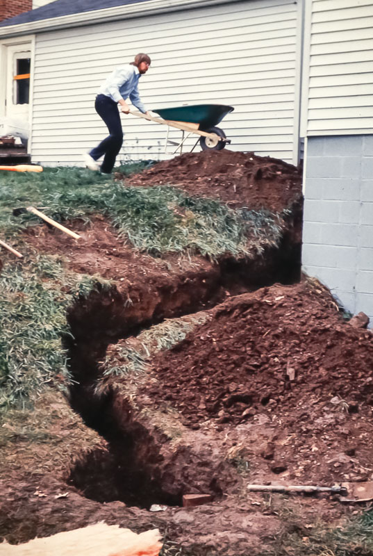 October 1983 Digging a drain next to basement wall
